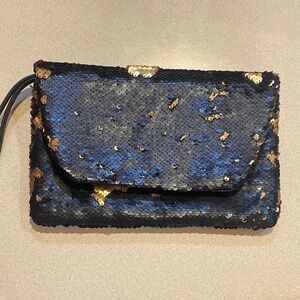 A new day Sequin Large Clutch Bag - Black and Gold.